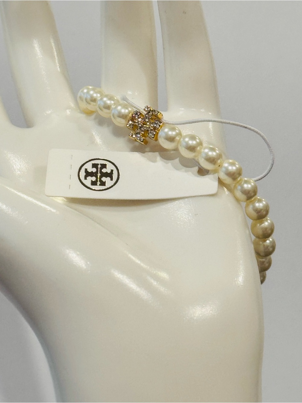 Tory Burch Polished Gold Clover Motif Bracelet